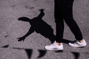 Man standing with shadow